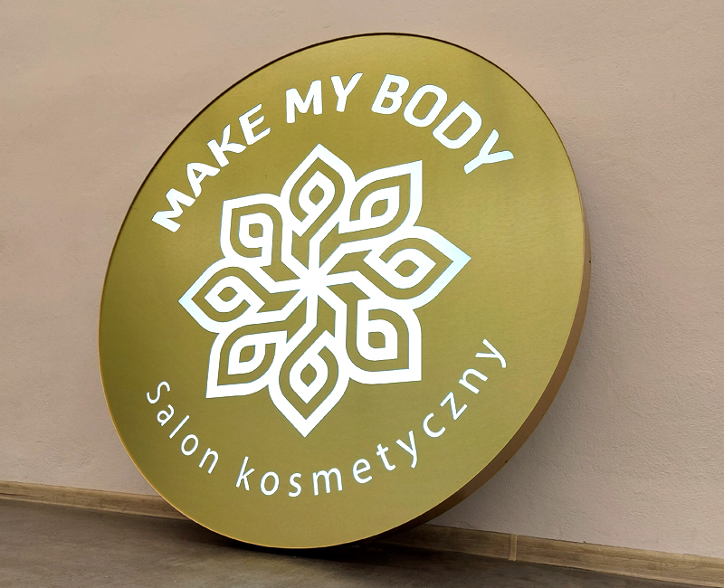 Logo podświetlane Make My body złote okrągłe od studio efekt